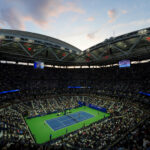 September 02, 2019 - The sun sets as a match is played in Arthur Ashe Stadium at the 2019 US Open. (Photo by Daniel Shirey/USTA)